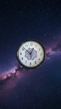 Wall clock with decorative face in a cardboard box labeled 'WALL CLOCK'.